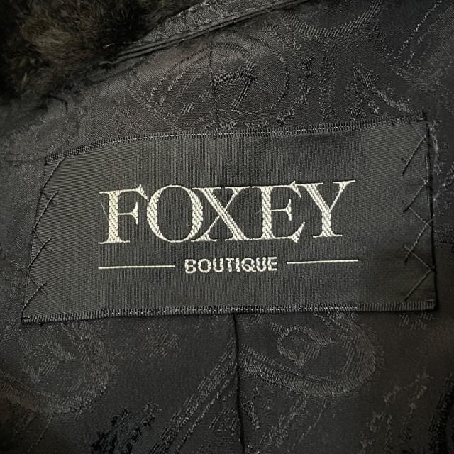 FOXEY(フォクシー)のフォクシー コート レディース美品  - 黒 レディースのジャケット/アウター(その他)の商品写真