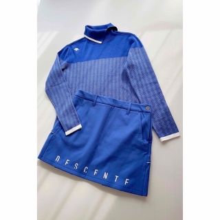 デサント(DESCENTE)のデサントゴルフ　セットアップ　タートルネックセーター　ストレッチ裏起毛スカート(ウエア)