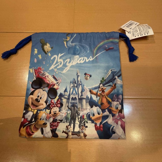 Disney(ディズニー)の新品、未使用　東京ディズニーリゾート25th巾着 キッズ/ベビー/マタニティのこども用バッグ(ランチボックス巾着)の商品写真