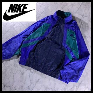 ナイキ(NIKE)の古着 NIKE ナイキ ナイロンジャケット ブルゾン ネイビー 紫 緑 XL(ナイロンジャケット)