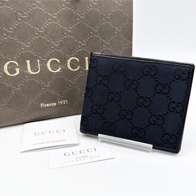 Gucci - ✨極美品✨グッチ 二つ折り財布 お札入れ GG柄 キャンバス