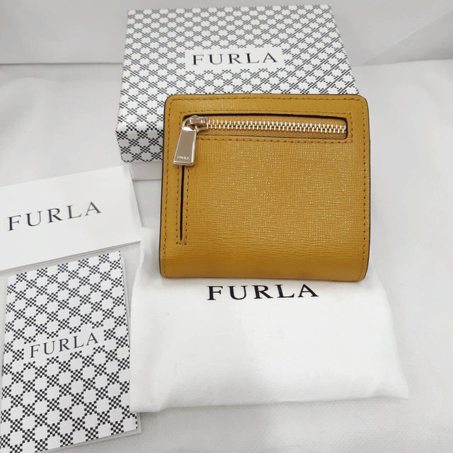 Furla(フルラ)のフルラ　FURLA 二つ折り財布　バビロンS バイフォールウォレット　マスタード レディースのファッション小物(財布)の商品写真