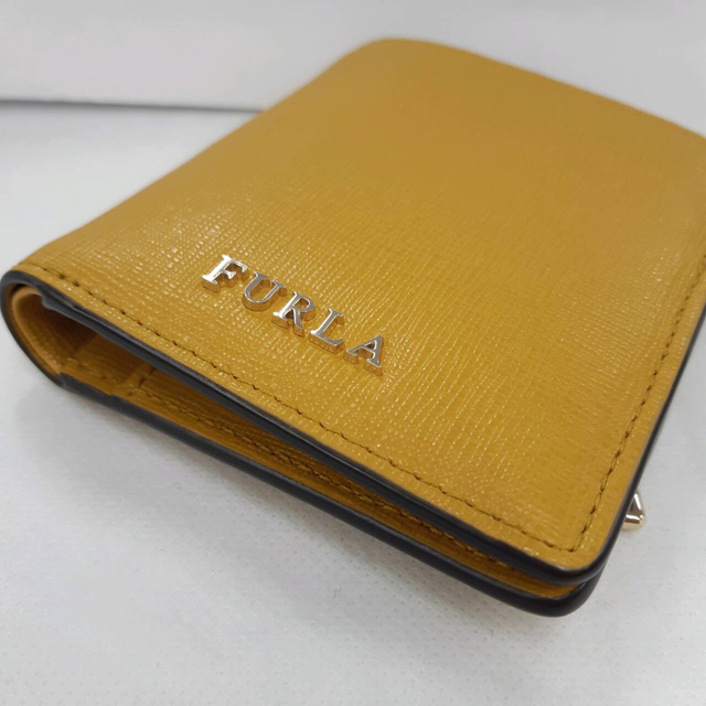 Furla(フルラ)のフルラ　FURLA 二つ折り財布　バビロンS バイフォールウォレット　マスタード レディースのファッション小物(財布)の商品写真