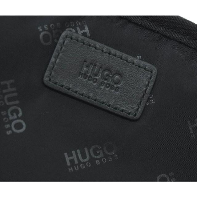 HUGO BOSS(ヒューゴボス)の【新品】ヒューゴ・ボス ポーチ ロゴ ブラックxホワイト 30121 メンズのバッグ(セカンドバッグ/クラッチバッグ)の商品写真