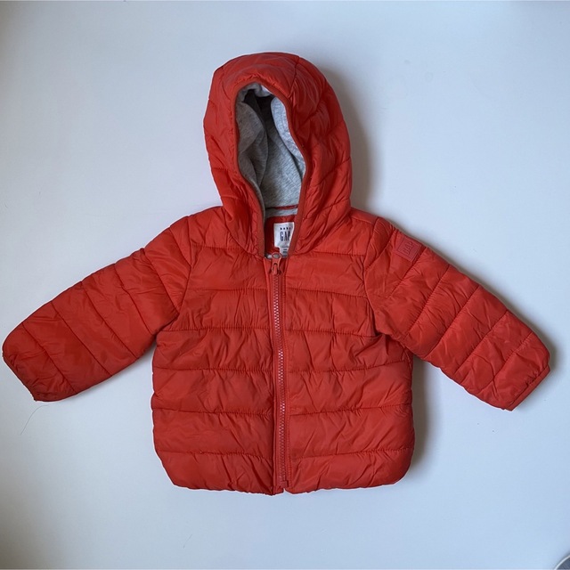 GAP Kids(ギャップキッズ)のGAP オレンジ　ダウン　80cm キッズ/ベビー/マタニティのベビー服(~85cm)(ジャケット/コート)の商品写真