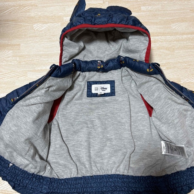 babyGAP(ベビーギャップ)のgap ミッキーダウン　サイズ18-24 80 キッズ/ベビー/マタニティのベビー服(~85cm)(ジャケット/コート)の商品写真