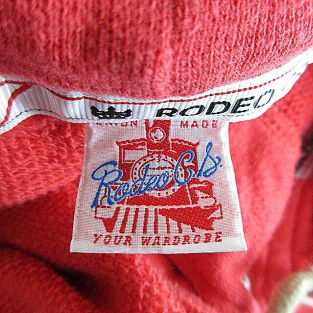 RODEO CROWNS(ロデオクラウンズ)のロデオクラウンズ ジャケット ブルゾン ジャンパー 長袖 フード ワッペン 赤 レディースのジャケット/アウター(ブルゾン)の商品写真