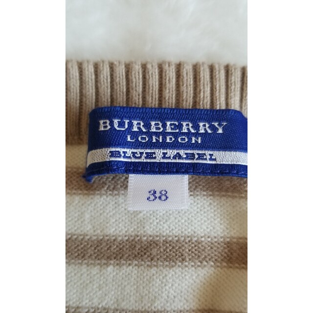 BURBERRY BLUE LABEL(バーバリーブルーレーベル)のBURBERRYロンドンブルーレーベル　ニットワンピース　リボン　金具つき レディースのトップス(ニット/セーター)の商品写真