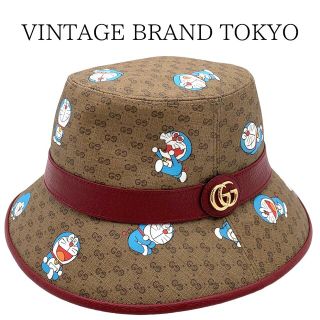 グッチ(Gucci)のGUCCI グッチ ハット バケットハット ドラえもん コラボ ミニGGスプリーム Mサイズ ファッションアイテム 帽子 648846 コットン  ポリエステル   ブラウン 茶 レッド 赤 ゴールド金具 レディース 人気 美品【中古品】(ハット)