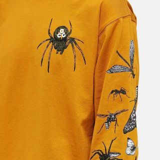 ナイキ(NIKE)の【海外限定】NIKE ACG INSECTS TEE 海外Lサイズ マスタード(Tシャツ/カットソー(七分/長袖))