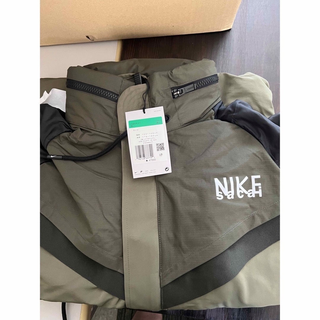 NIKE(ナイキ)のNIKE サカイ　トレンチジャケット　XL 新品 メンズのジャケット/アウター(トレンチコート)の商品写真