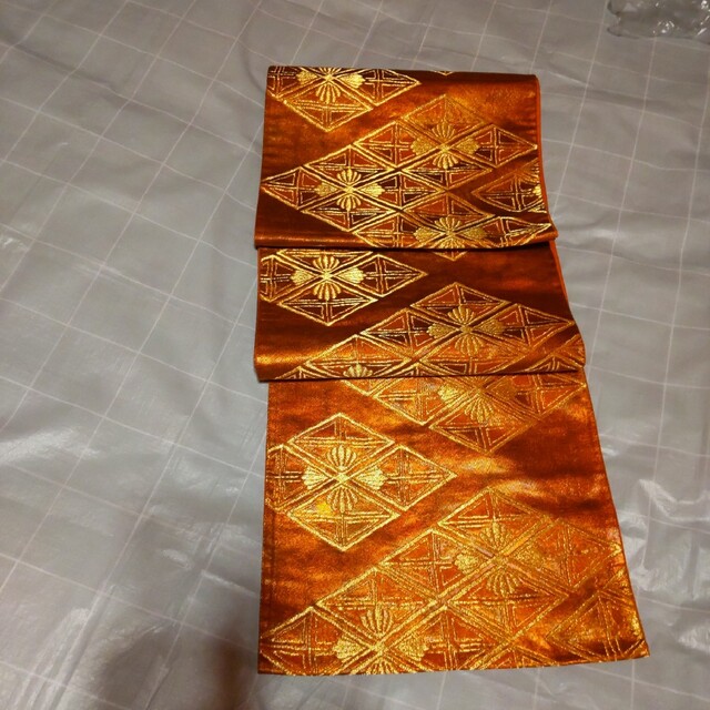 6. 錦糸金糸・正絹 緋色袋帯 新品未使用の美品です。