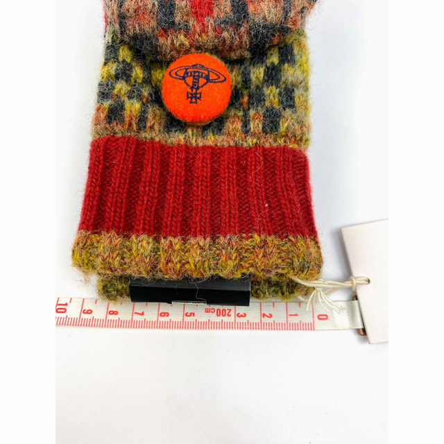 Vivienne Westwood(ヴィヴィアンウエストウッド)のヴィヴィアンウエストウッド　手袋　フード付き手袋　ロゴボタン　指切り　総柄　毛糸 レディースのファッション小物(手袋)の商品写真