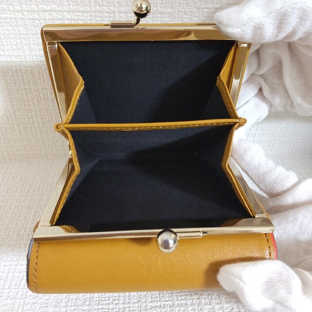 Paul Smith(ポールスミス)のポールスミス スワールトリム 三つ折り カーフスキン がま口 ミニ財布 イエロー レディースのファッション小物(財布)の商品写真