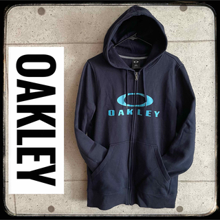 オークリー(Oakley)の【美品】OAKLEY(オークリー)★ロゴジップアップパーカー★紺S★(パーカー)