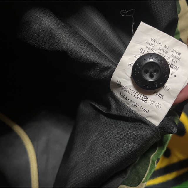 A BATHING APE(アベイシングエイプ)のAPE BAPE KAWS UNDEFEATED M-65 ジャケット　CAMO メンズのジャケット/アウター(ミリタリージャケット)の商品写真