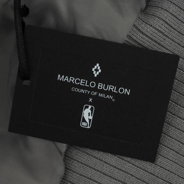 MARCELO BURLON(マルセロブロン)のマルセロバーロン マルセロブロン× エヌビーエー ジャケット S ライトグレー  メンズのジャケット/アウター(スタジャン)の商品写真
