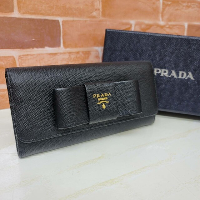 最高の品質の 美品PRADA☆鑑定済☆サフィアーノ 黒 ブラック リボン