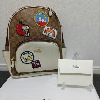 コーチ(COACH)のCOACH コーチ スヌーピー コラボ リュック ブラウン ワッペン(リュック/バックパック)