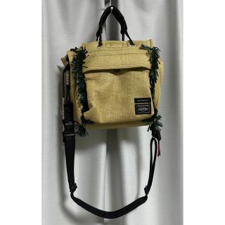 トーガ(TOGA)のtoga × porter string bag beige(ショルダーバッグ)