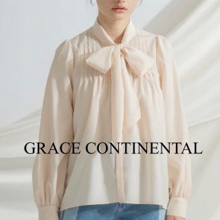 グレースコンチネンタル(GRACE CONTINENTAL)の【グレースコンチネンタル】リボンタイタックブラウス ピンク 38 (シャツ/ブラウス(長袖/七分))