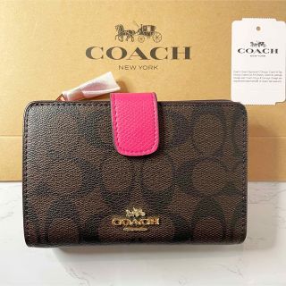 コーチ(COACH)のCOACH シグネチャー ミディアムコーナージップ 折り財布 ブラウン/ピンク(財布)