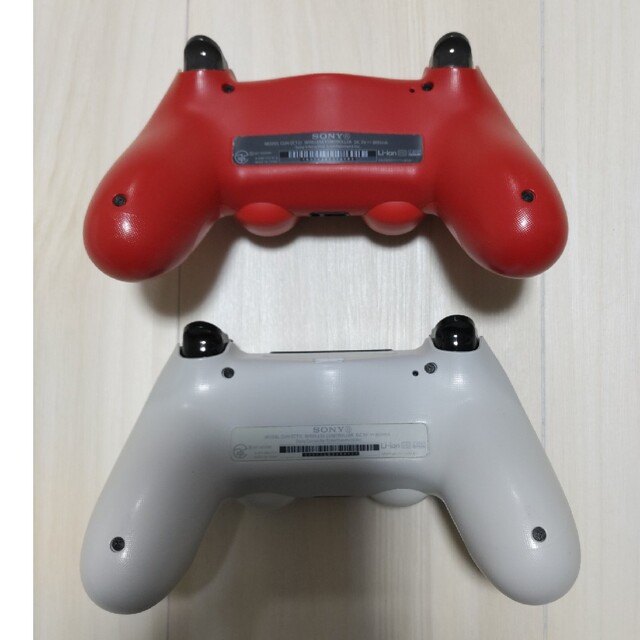 PlayStation4(プレイステーション4)の中古ジャンク品 ソニー PS4 コントローラー 2個 赤 白 エンタメ/ホビーのエンタメ その他(その他)の商品写真