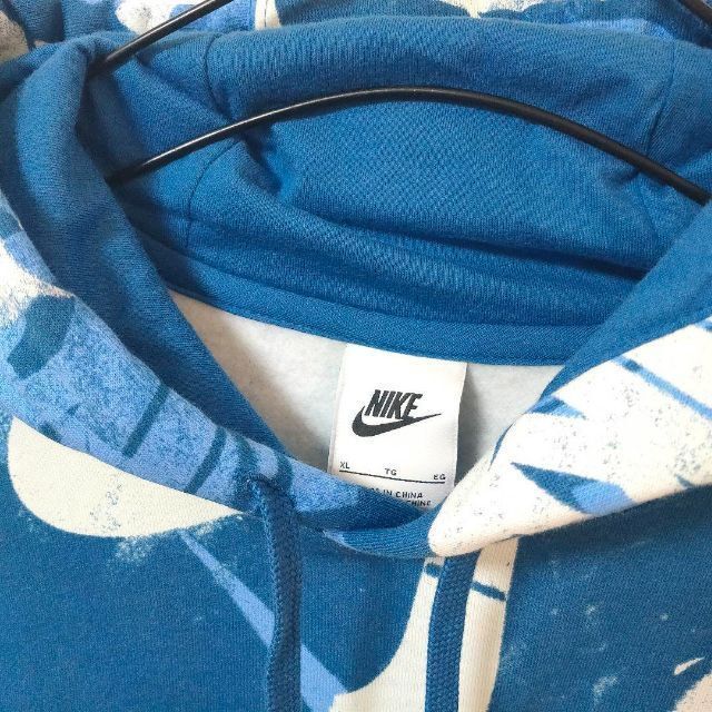 NIKE - NIKE 青 プルパーカー AOP スウッシュ総柄 フリース メンズXL