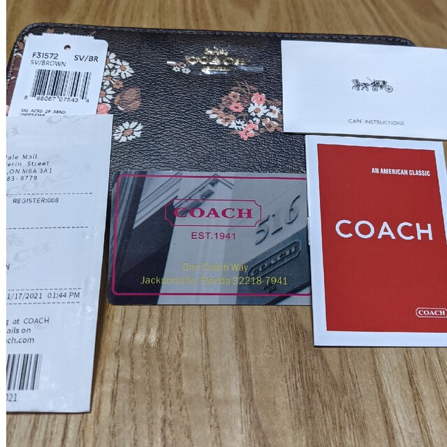 COACH(コーチ)のCOACH  長財布　黒系シグネチャー　花柄模様 レディースのファッション小物(財布)の商品写真