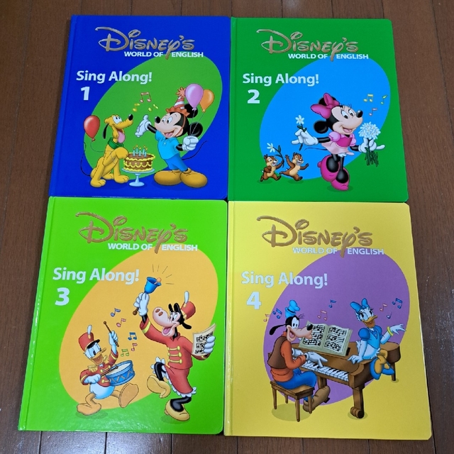 Disney(ディズニー)のﾃﾞｨｽﾞﾆｰ英語ｼｽﾃﾑ　Sing Along! 1～4book キッズ/ベビー/マタニティのおもちゃ(知育玩具)の商品写真