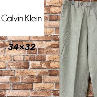 カルバンクライン(Calvin Klein)のカルバンクライン　カジュアルパンツ　スラックス　ベージュ　ゆるだぼ　34/32(スラックス)