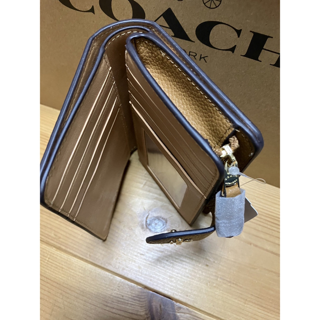 COACH(コーチ)の二つ折り財布 アウトレットCOACH チャーリーブラウン ホワイト COACH レディースのファッション小物(財布)の商品写真