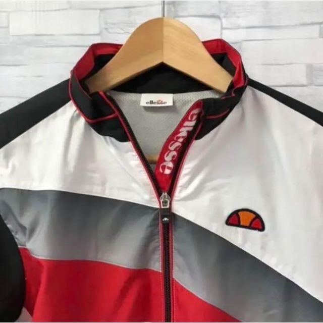 ellesse(エレッセ)の【美品】エレッセ　TEAMウインドアップジャケット 　メンズ　M　ゴルフ　テニス スポーツ/アウトドアのテニス(ウェア)の商品写真