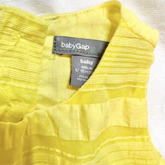 babyGAP(ベビーギャップ)のベビーギャップ　イエロー　ワンピース　80 キッズ/ベビー/マタニティのベビー服(~85cm)(ワンピース)の商品写真