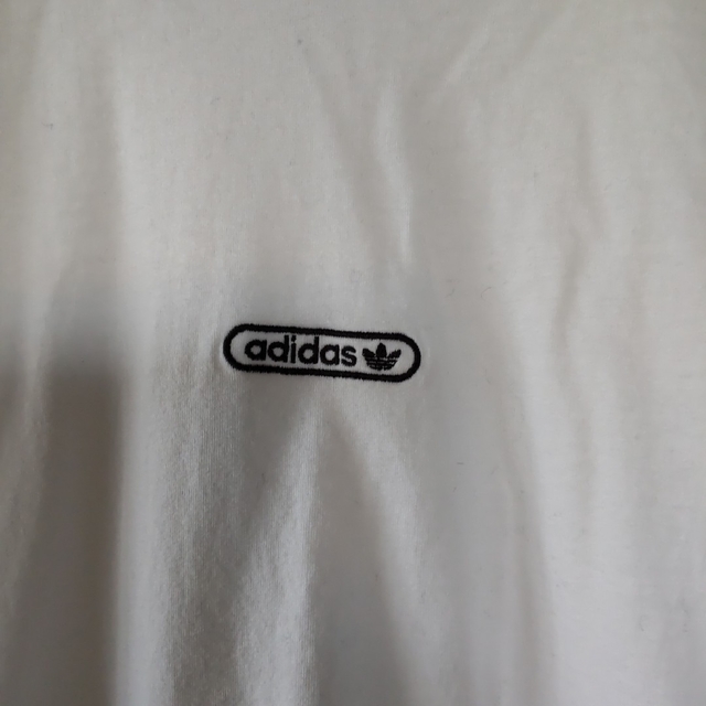 adidas(アディダス)のadidas リニアリピート ロンT  ロゴ ライン S 白 メンズのトップス(Tシャツ/カットソー(七分/長袖))の商品写真