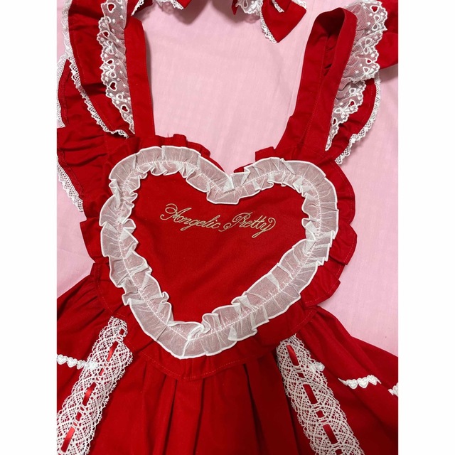 Angelic Pretty(アンジェリックプリティー)のAngelic Pretty Heart胸あて付スカート カチューシャ アカ レディースのスカート(ひざ丈スカート)の商品写真