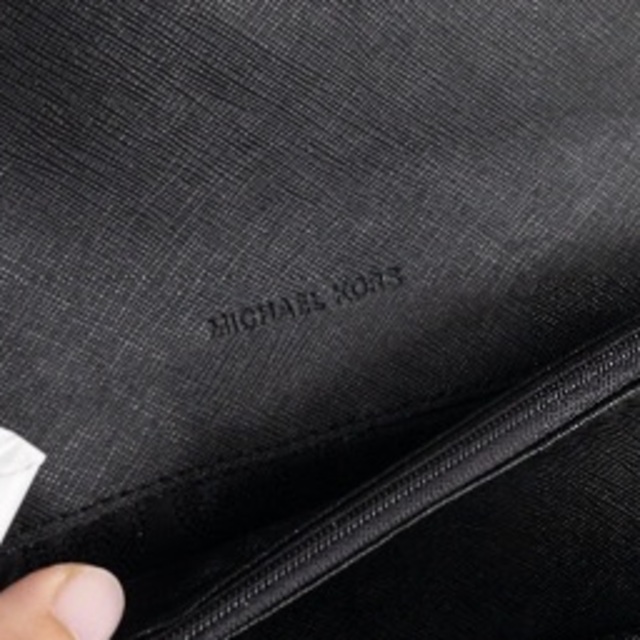 Michael Kors(マイケルコース)の新品未使用品 MICHAEL KORS スタッズリボン付き長財布 ブラック レディースのファッション小物(財布)の商品写真