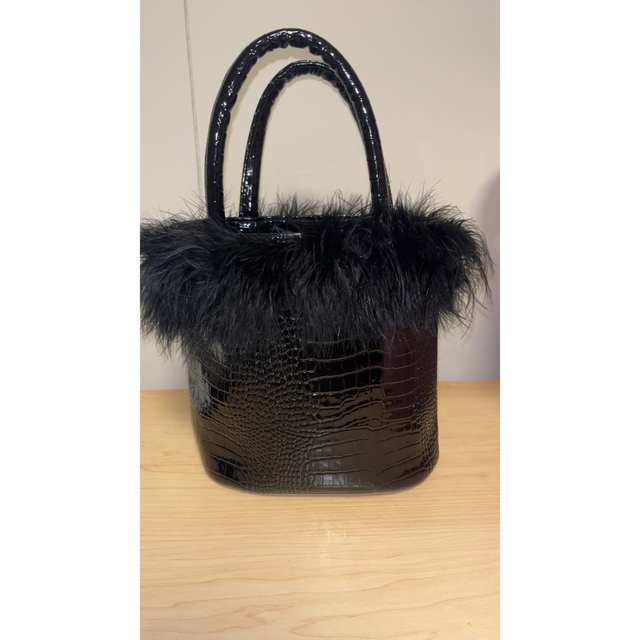 the virgins croco feather vanity bag