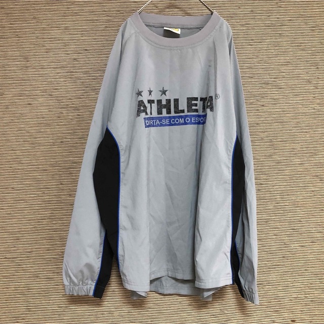 ATHLETA(アスレタ)の【アスレタ】ピステ　シャカシャカ　長袖　スポーツウェア　サッカー　デカロゴ45 スポーツ/アウトドアのサッカー/フットサル(ウェア)の商品写真