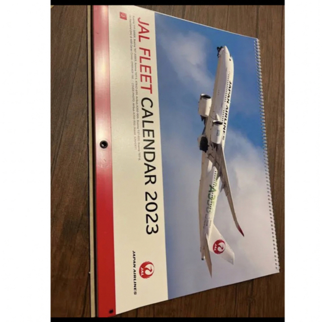 JAL(日本航空)(ジャル(ニホンコウクウ))のJAL FLEET壁掛けCALENDAR　2023未開封 インテリア/住まい/日用品の文房具(カレンダー/スケジュール)の商品写真