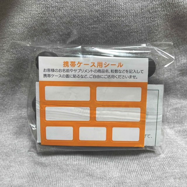 えがお(エガオ)の＊新品・未開封＊　くまモン　サプリケース　ピルケース　えがお　小物入れ エンタメ/ホビーのおもちゃ/ぬいぐるみ(キャラクターグッズ)の商品写真