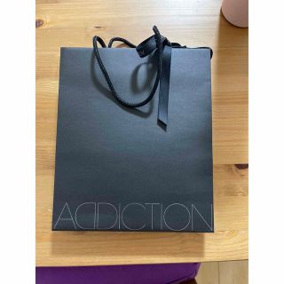 アディクション(ADDICTION)のADDICTION 紙袋中サイズ(ショップ袋)