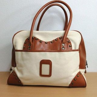 carnet leather canvas bag