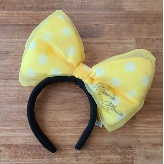 Disney(ディズニー)の美品　ミニー　カチューシャ　オーガンジー黄色リボン エンタメ/ホビーのコスプレ(アクセサリー)の商品写真