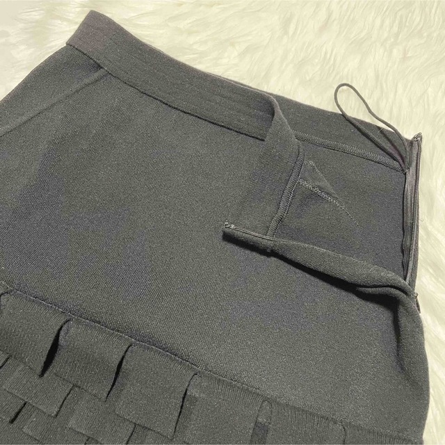 CHANEL(シャネル)の本物 美品 シャネル COCO装飾ボタン ティアード ニット スカート 36 黒 レディースのスカート(ミニスカート)の商品写真