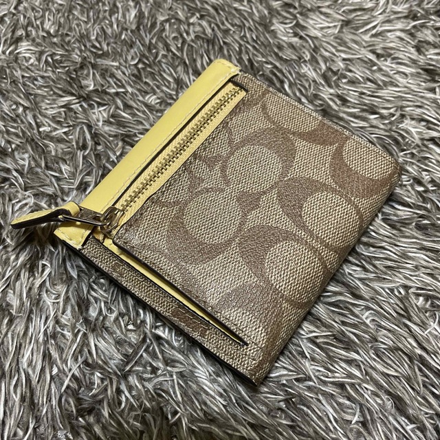 《値下げ》COACH 三つ折り財布　黄色 1