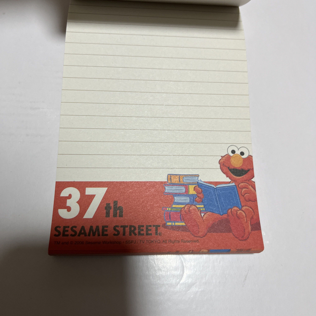 SESAME STREET(セサミストリート)のエルモさんグッズセット①②③　ギフトバッグLL、ランチナップ、メモ帳（中古品）等 エンタメ/ホビーのアニメグッズ(その他)の商品写真