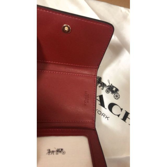 98%OFF!】 COACH コーチ シグネチャー花柄 三つ折財布 カーキマルチ