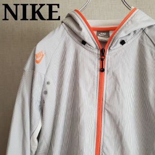 ナイキ(NIKE)のNIKE FIT ストライプ グレーオレンジ(パーカー)