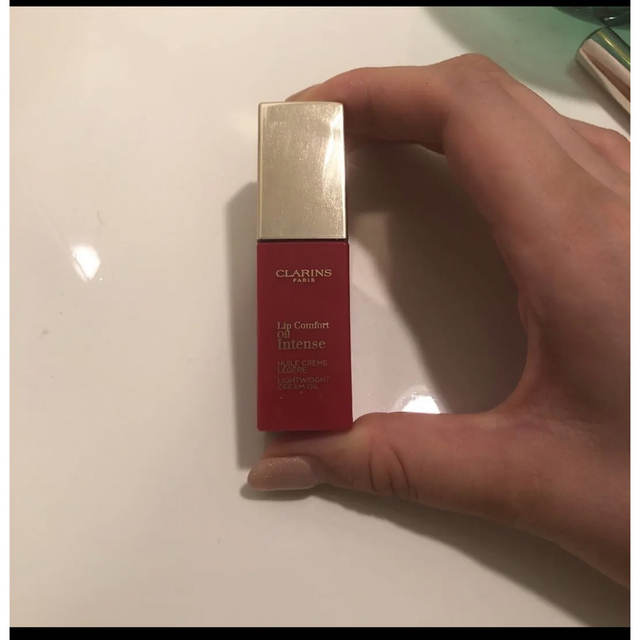 CLARINS(クラランス)のクラランス コンフォート リップオイル インテンスレッド07 コスメ/美容のベースメイク/化粧品(口紅)の商品写真